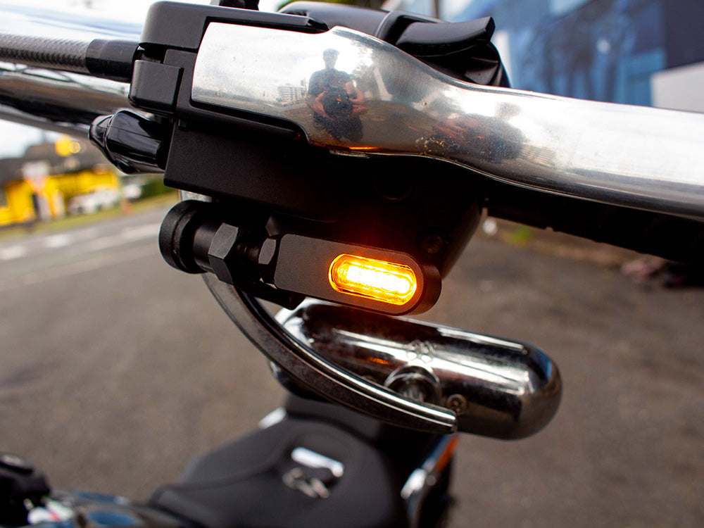 Under Perch Turn Signals - Black. Fits Softail 2025up