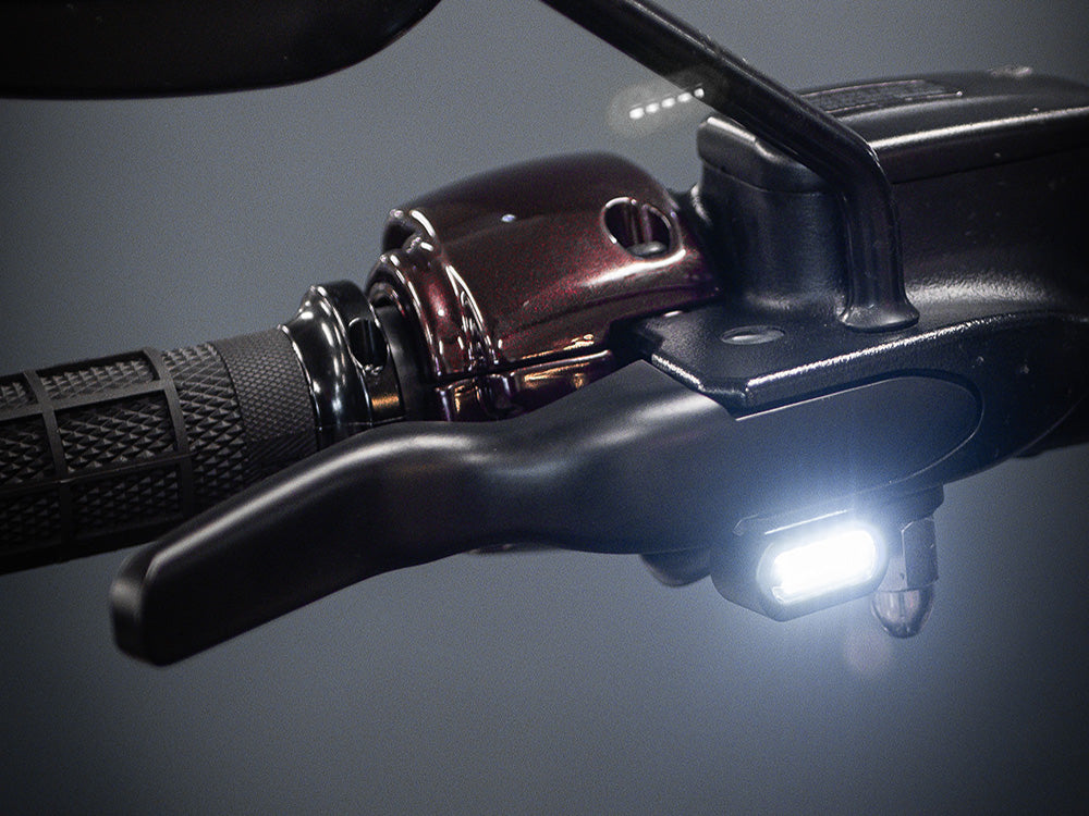 Under Perch Turn Signals with Daytime Running Lights - Black. Fits Softail 2015-2024 & Touring 2009-2023 Models with Cable Clutch.
