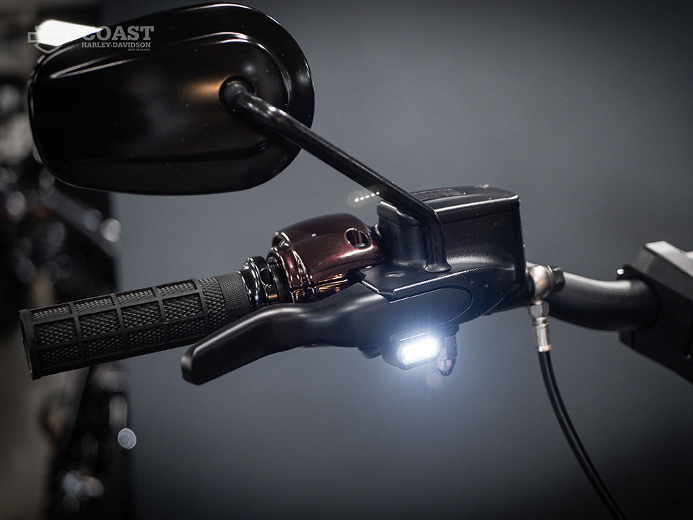 Under Perch Turn Signals with Daytime Running Lights - Black. Fits Softail 2015-2024 & Touring 2009-2023 Models with Cable Clutch.