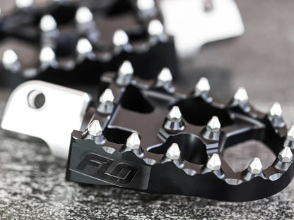 V2 MX Footpegs - Black. Fits Softail 2018up Front Rider
