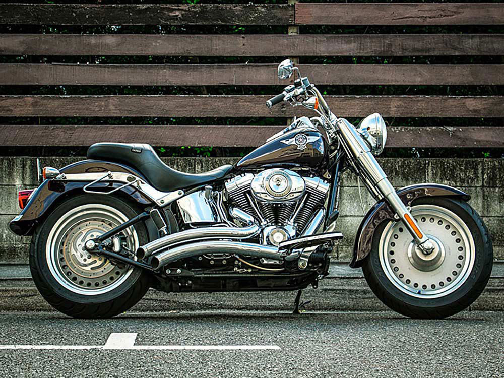 Sharp Curve Radius Exhaust - Chrome with Chrome End Caps. Fits Softail 1986-2017.