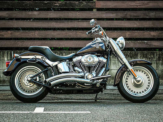 Sharp Curve Radius Exhaust - Chrome with Chrome End Caps. Fits Softail 1986-2017.