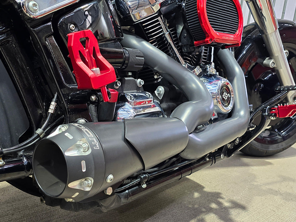 American Outlaw Shorty 2-into-1 Exhaust - Black with Black End Cap. Fits Softail 2018up with Non-240 Rear Tyre