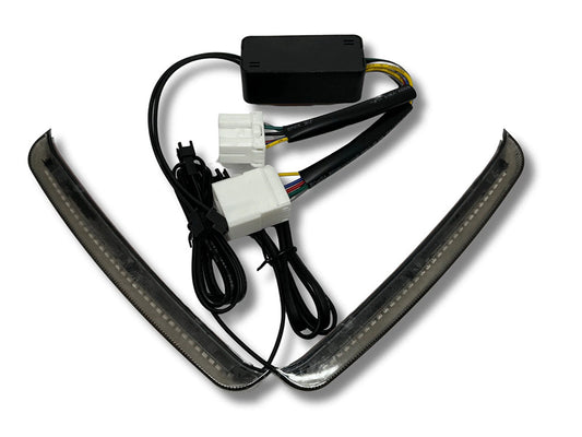 Sequential Slimline Saddlebag Lights. Red Run/Brake, Amber Turn with Smoke Lens. Fits Touring 1997-2013.