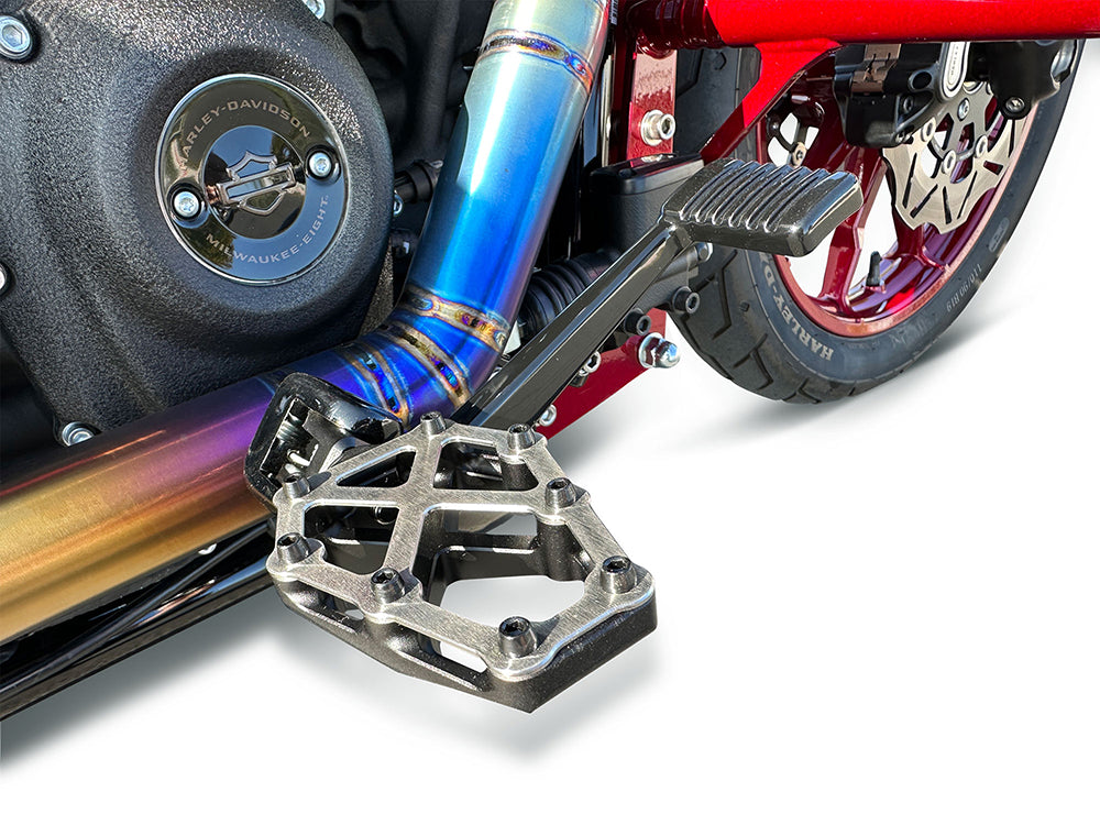 NXL Footpegs - Black & Stainless. Fits Softail 2018up, Pan America 2021up & Sportster S 2021up Front Rider