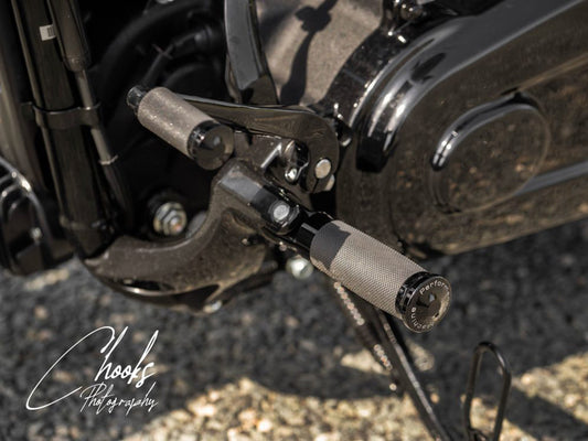 Contour Rubber Wrapped Footpegs - Black. Fits Softail 2018up Front Rider