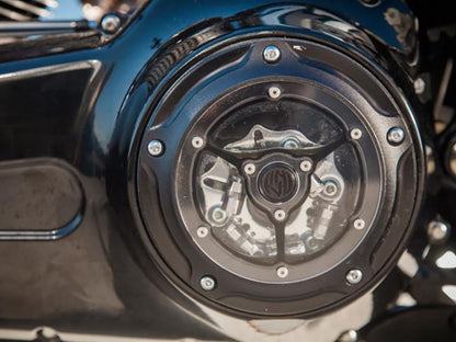 Clarity Derby Cover - Black Ops. Fits Softail 1999-2018, Dyna 1999-2017 & Touring 1999-2015.